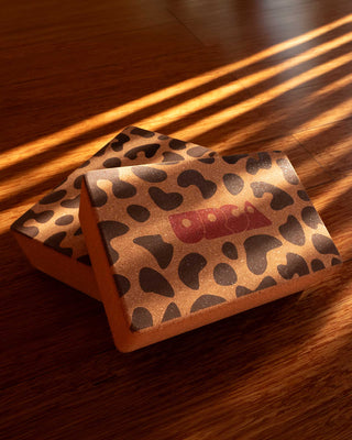 yoga bricks 100% cork for extra grip and stability, woodden floor with sunrays and hard shadows